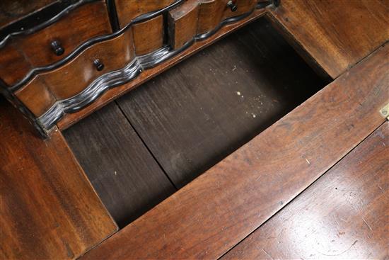 A mid 18th century Dutch Colonial ebony and teak bureau W.100cm